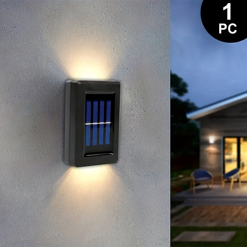 Orlite Svart LED Vägglampa – Hållbar och Stämningsfull Utomhusbelysning