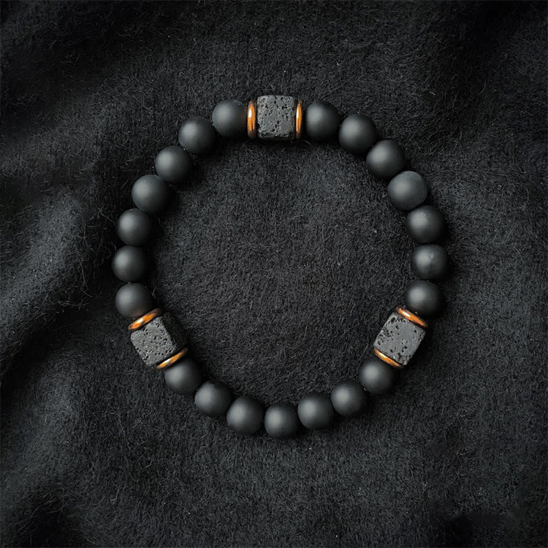 Matte Black Onyx och Kub Lava Sten Balansarmband – Aurelia