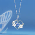 Halskette aus Sterlingsilber mit Herz und Muschelblume