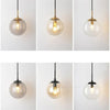 GlacioGlow Retro Glasboll Vägglampa | Elegant postmodern sänglampa för varmt atmosfäriskt ljus