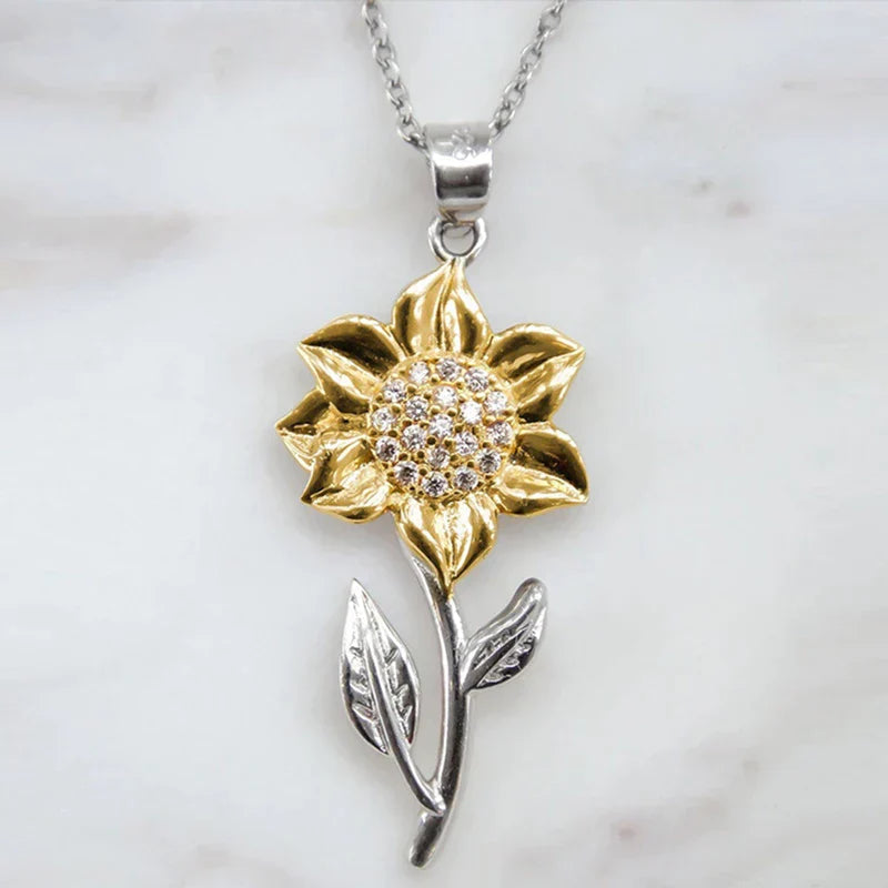 Guldhalsband för damer i sterlingsilver med solrosberlock – Marélie