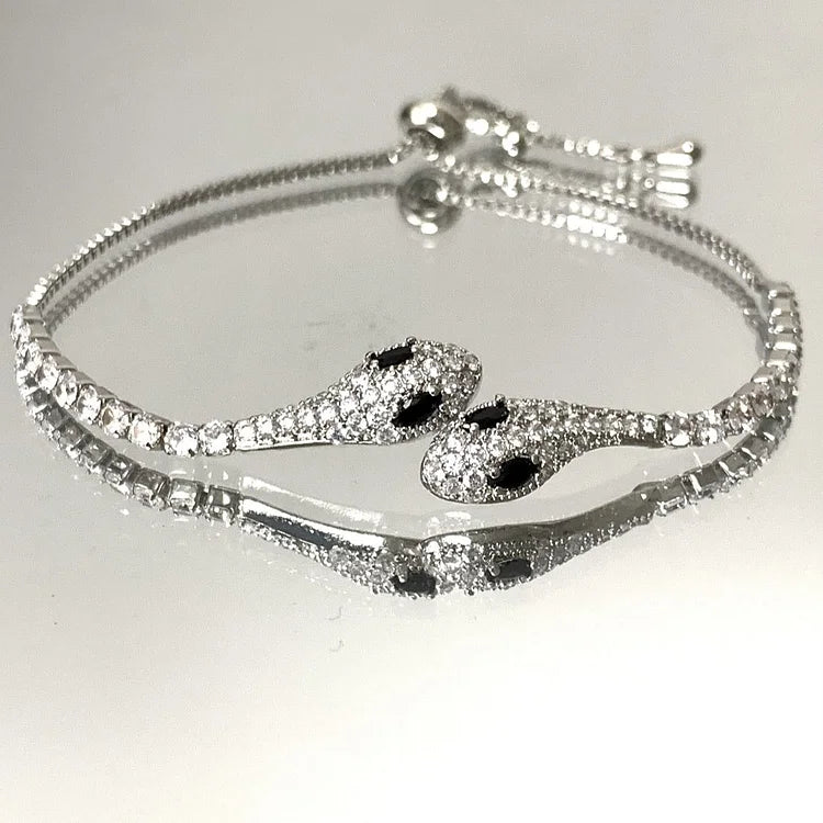 Silverormsarmband med zirkonia – Lyra